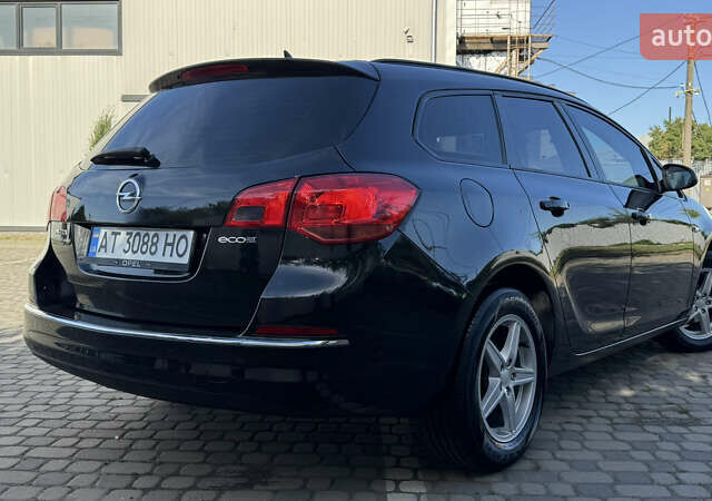 Черный Опель Астра, объемом двигателя 1.25 л и пробегом 220 тыс. км за 7950 $, фото 12 на Automoto.ua