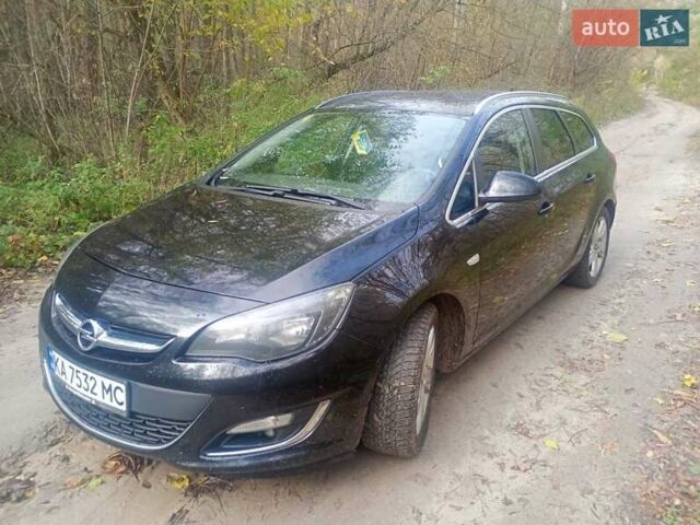 Опель Астра 2013 у Василькове на Automoto.ua Чорний Опель Астра, об'ємом двигуна 1.69 л та пробігом 228 тис. км за 7300 $, фото 12 на Automoto.ua