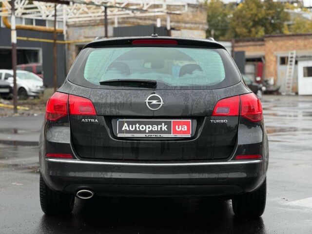 Черный Опель Астра, объемом двигателя 1.4 л и пробегом 211 тыс. км за 6940 $, фото 4 на Automoto.ua