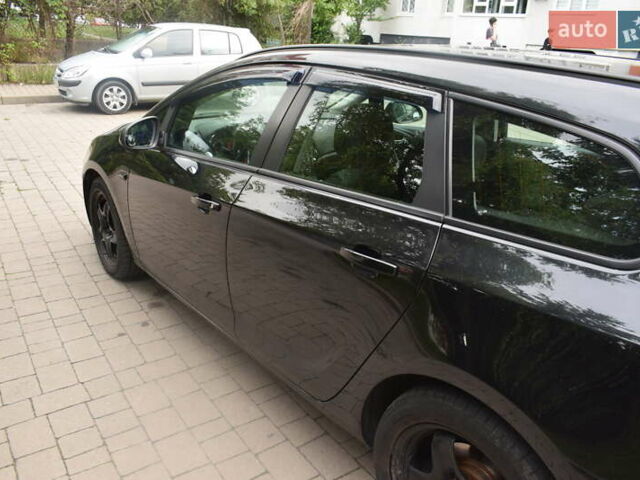 Черный Опель Астра, объемом двигателя 1.69 л и пробегом 222 тыс. км за 7500 $, фото 1 на Automoto.ua