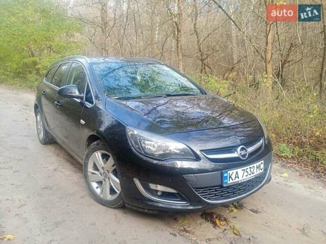 Опель Астра 2013 у Василькове на Automoto.ua Чорний Опель Астра, об'ємом двигуна 1.69 л та пробігом 228 тис. км за 7300 $, фото 10 на Automoto.ua