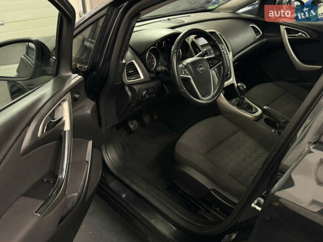 Черный Опель Астра, объемом двигателя 1.4 л и пробегом 203 тыс. км за 7250 $, фото 7 на Automoto.ua