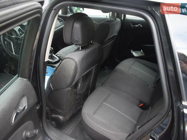 Черный Опель Астра, объемом двигателя 1.69 л и пробегом 222 тыс. км за 7500 $, фото 3 на Automoto.ua