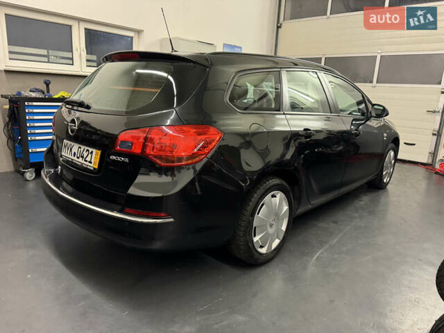 Черный Опель Астра, объемом двигателя 1.4 л и пробегом 203 тыс. км за 7250 $, фото 21 на Automoto.ua