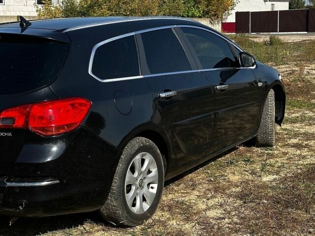 Черный Опель Астра, объемом двигателя 1.7 л и пробегом 309 тыс. км за 5600 $, фото 10 на Automoto.ua