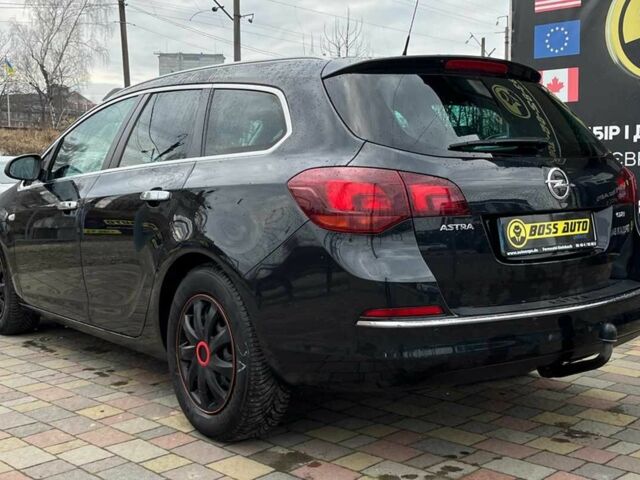Черный Опель Астра, объемом двигателя 1.7 л и пробегом 285 тыс. км за 8700 $, фото 4 на Automoto.ua