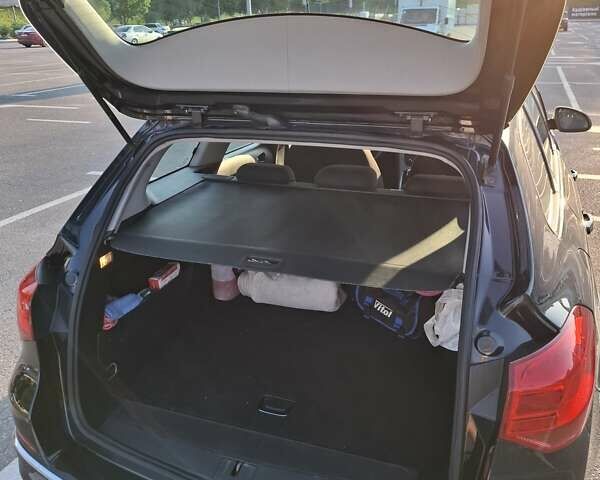 Черный Опель Астра, объемом двигателя 1.4 л и пробегом 236 тыс. км за 8200 $, фото 10 на Automoto.ua