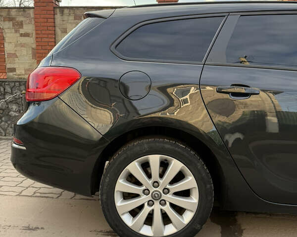 Черный Опель Астра, объемом двигателя 1.7 л и пробегом 258 тыс. км за 6999 $, фото 83 на Automoto.ua