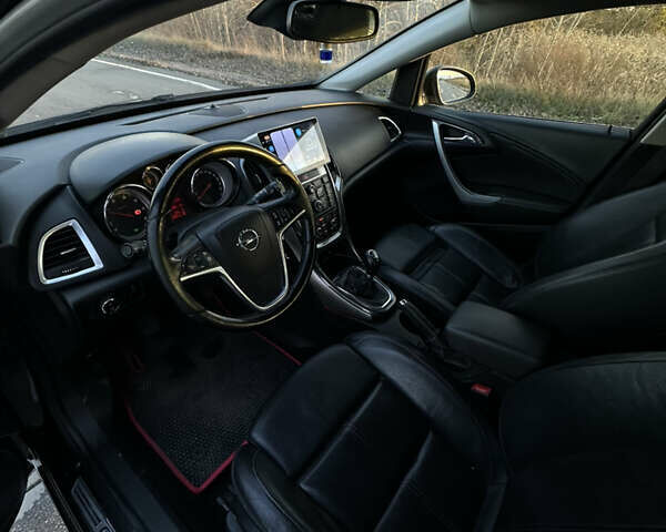 Опель Астра 2013 у Житомирі на Automoto.ua Чорний Опель Астра, об'ємом двигуна 1.7 л та пробігом 193 тис. км за 7800 $, фото 24 на Automoto.ua