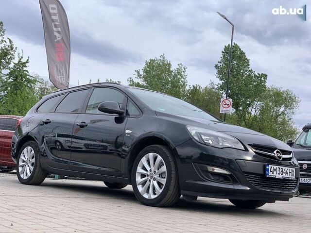 Черный Опель Астра, объемом двигателя 1.7 л и пробегом 234 тыс. км за 7855 $, фото 5 на Automoto.ua