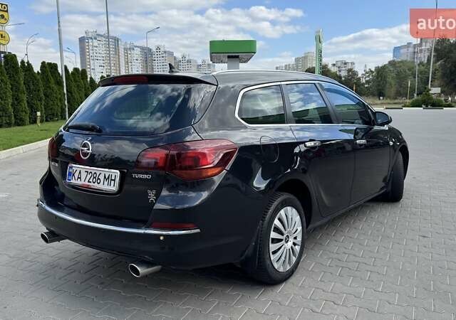 Черный Опель Астра, объемом двигателя 1.36 л и пробегом 250 тыс. км за 7500 $, фото 11 на Automoto.ua
