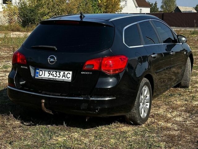 Черный Опель Астра, объемом двигателя 1.7 л и пробегом 309 тыс. км за 5600 $, фото 9 на Automoto.ua