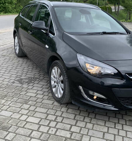 Черный Опель Астра, объемом двигателя 1.7 л и пробегом 234 тыс. км за 8700 $, фото 2 на Automoto.ua