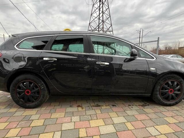 Черный Опель Астра, объемом двигателя 1.7 л и пробегом 285 тыс. км за 8700 $, фото 7 на Automoto.ua