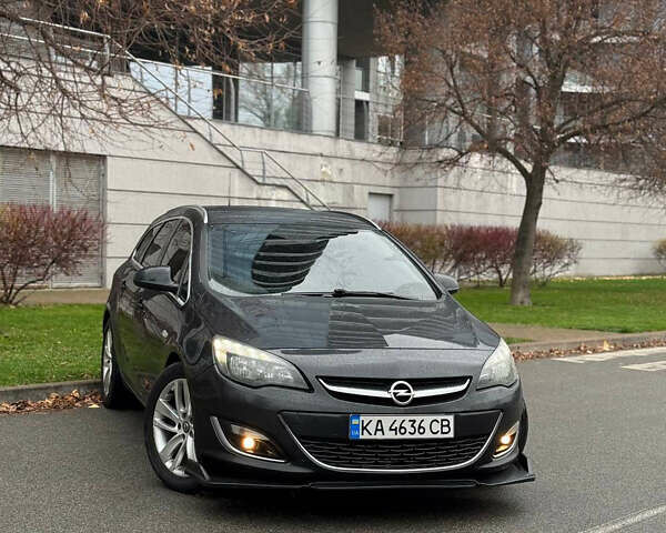 Черный Опель Астра, объемом двигателя 1.7 л и пробегом 245 тыс. км за 7000 $, фото 1 на Automoto.ua