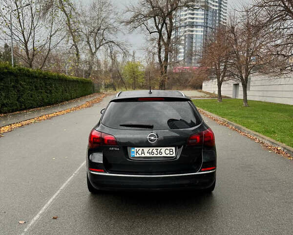 Черный Опель Астра, объемом двигателя 1.7 л и пробегом 245 тыс. км за 7000 $, фото 11 на Automoto.ua
