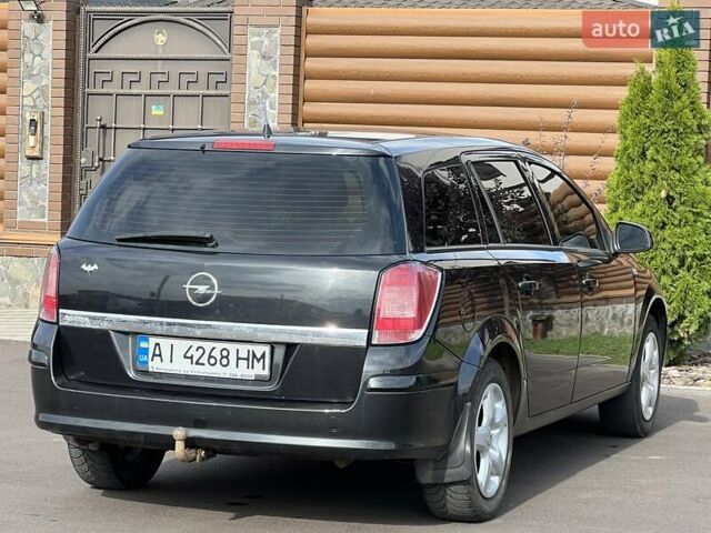 Черный Опель Астра, объемом двигателя 1.6 л и пробегом 145 тыс. км за 6400 $, фото 17 на Automoto.ua