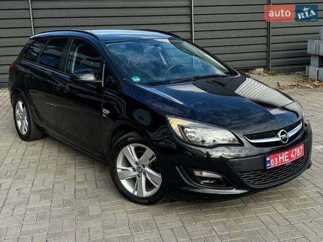 Черный Опель Астра, объемом двигателя 1.7 л и пробегом 218 тыс. км за 8500 $, фото 7 на Automoto.ua