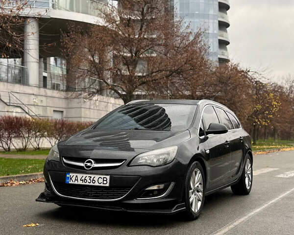 Черный Опель Астра, объемом двигателя 1.7 л и пробегом 245 тыс. км за 7000 $, фото 4 на Automoto.ua