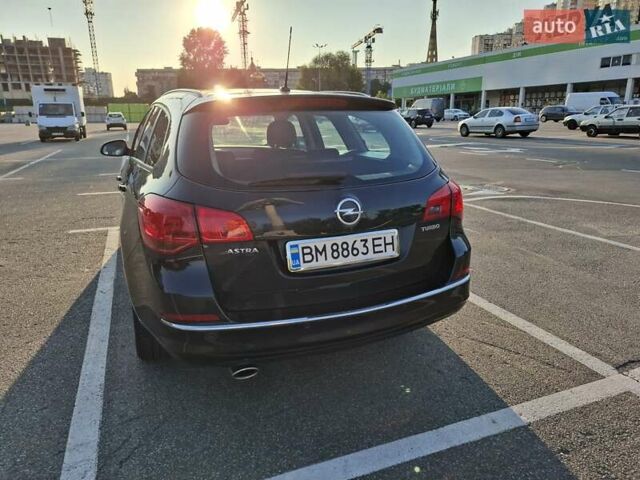Черный Опель Астра, объемом двигателя 1.4 л и пробегом 236 тыс. км за 8200 $, фото 14 на Automoto.ua