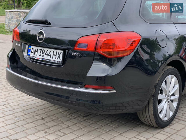 Черный Опель Астра, объемом двигателя 1.7 л и пробегом 234 тыс. км за 8599 $, фото 21 на Automoto.ua