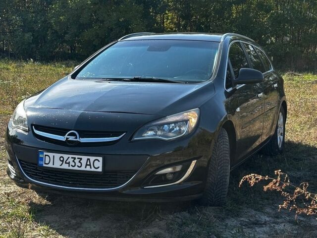 Черный Опель Астра, объемом двигателя 1.7 л и пробегом 309 тыс. км за 5600 $, фото 2 на Automoto.ua