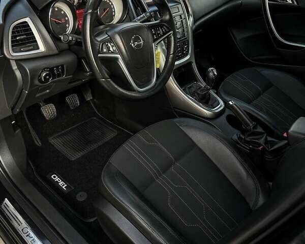 Черный Опель Астра, объемом двигателя 1.7 л и пробегом 218 тыс. км за 8500 $, фото 45 на Automoto.ua