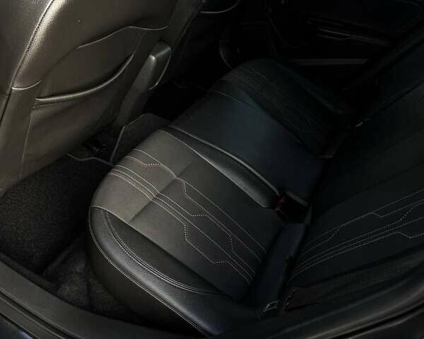 Черный Опель Астра, объемом двигателя 1.7 л и пробегом 218 тыс. км за 8500 $, фото 44 на Automoto.ua