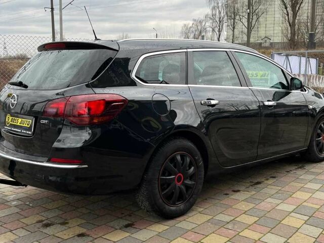 Черный Опель Астра, объемом двигателя 1.7 л и пробегом 285 тыс. км за 8700 $, фото 6 на Automoto.ua