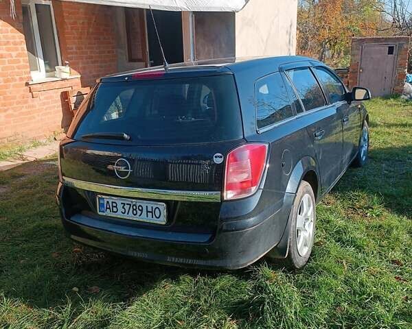 Черный Опель Астра, объемом двигателя 1.6 л и пробегом 239 тыс. км за 5800 $, фото 1 на Automoto.ua