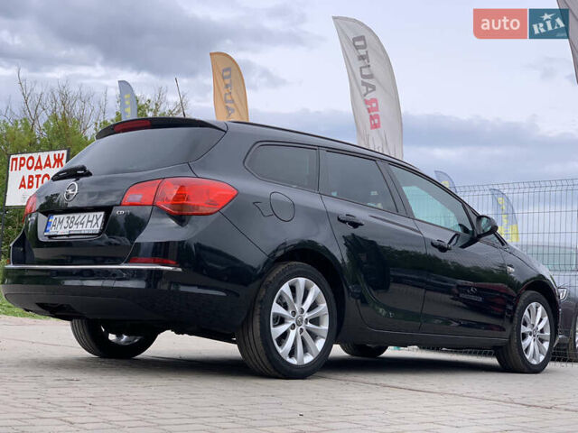 Черный Опель Астра, объемом двигателя 1.7 л и пробегом 234 тыс. км за 8599 $, фото 14 на Automoto.ua