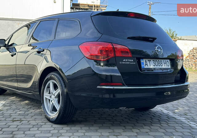 Черный Опель Астра, объемом двигателя 1.25 л и пробегом 220 тыс. км за 7950 $, фото 29 на Automoto.ua