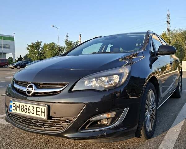 Черный Опель Астра, объемом двигателя 1.4 л и пробегом 236 тыс. км за 8200 $, фото 1 на Automoto.ua