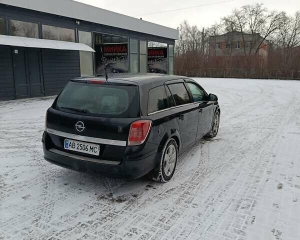 Черный Опель Астра, объемом двигателя 1.6 л и пробегом 239 тыс. км за 5800 $, фото 2 на Automoto.ua