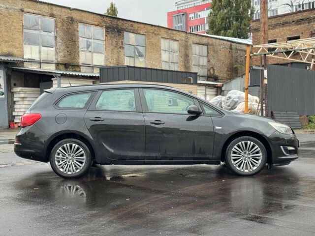 Черный Опель Астра, объемом двигателя 1.4 л и пробегом 211 тыс. км за 6940 $, фото 6 на Automoto.ua