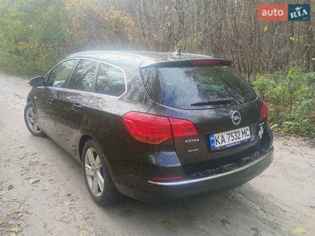 Опель Астра 2013 у Василькове на Automoto.ua Чорний Опель Астра, об'ємом двигуна 1.69 л та пробігом 228 тис. км за 7300 $, фото 22 на Automoto.ua