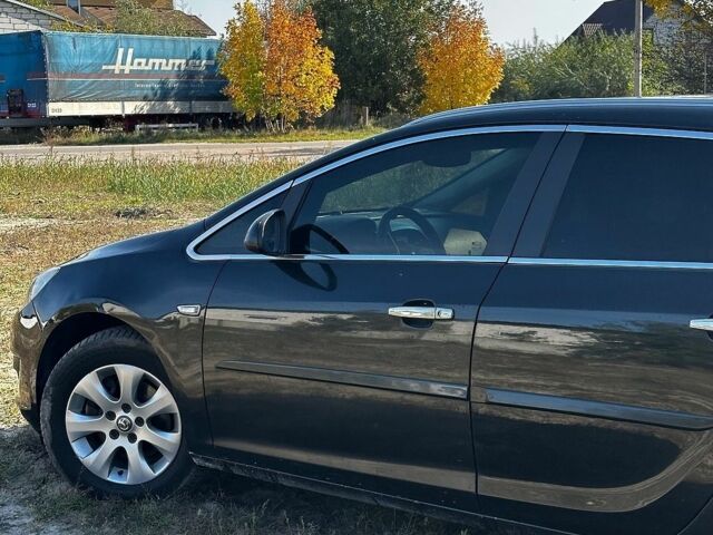 Черный Опель Астра, объемом двигателя 1.7 л и пробегом 309 тыс. км за 5600 $, фото 4 на Automoto.ua
