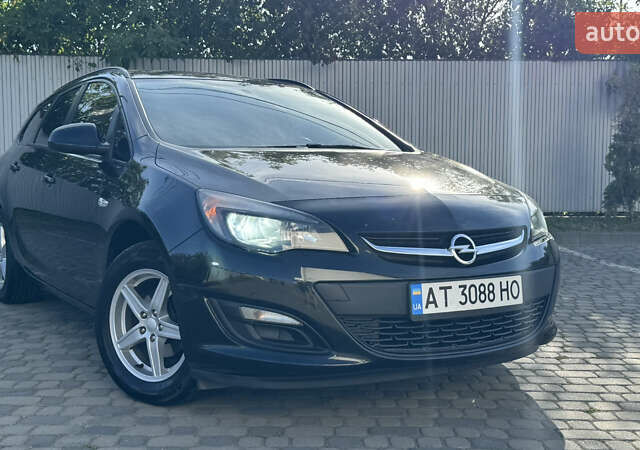Черный Опель Астра, объемом двигателя 1.25 л и пробегом 220 тыс. км за 7950 $, фото 13 на Automoto.ua