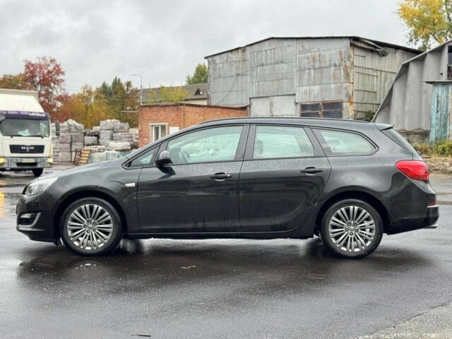 Черный Опель Астра, объемом двигателя 1.4 л и пробегом 211 тыс. км за 6940 $, фото 2 на Automoto.ua