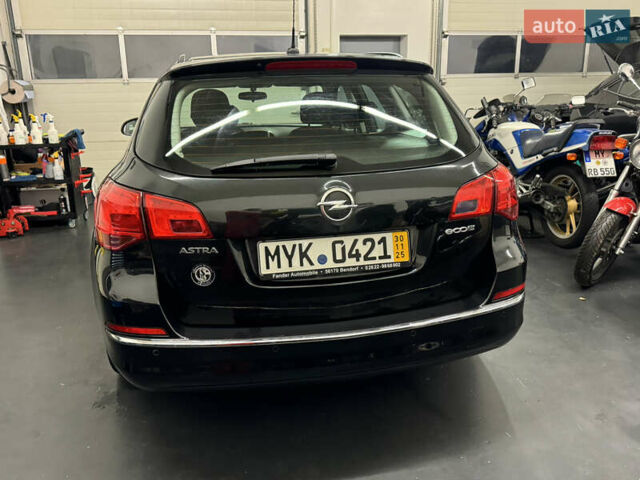 Черный Опель Астра, объемом двигателя 1.4 л и пробегом 203 тыс. км за 7250 $, фото 3 на Automoto.ua