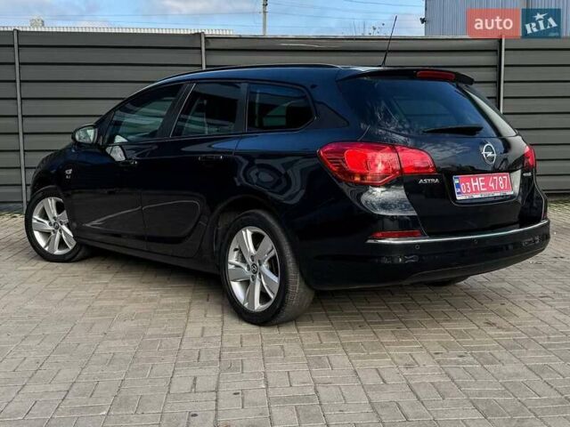 Черный Опель Астра, объемом двигателя 1.7 л и пробегом 218 тыс. км за 8500 $, фото 16 на Automoto.ua