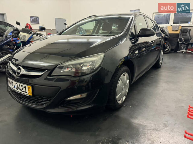 Черный Опель Астра, объемом двигателя 1.4 л и пробегом 203 тыс. км за 7250 $, фото 19 на Automoto.ua