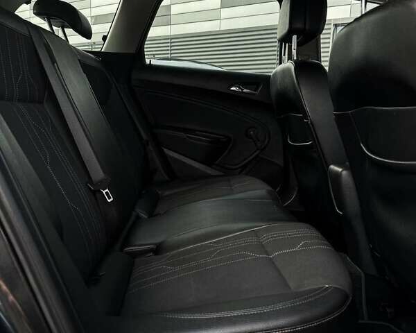 Черный Опель Астра, объемом двигателя 1.7 л и пробегом 218 тыс. км за 8500 $, фото 25 на Automoto.ua