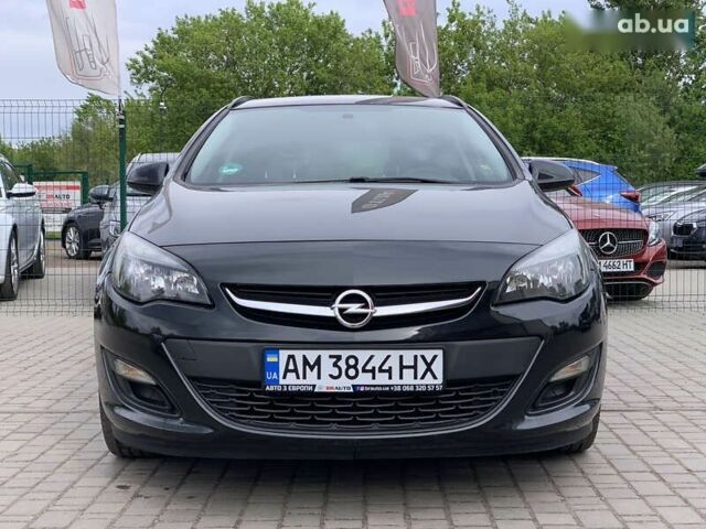 Черный Опель Астра, объемом двигателя 1.7 л и пробегом 234 тыс. км за 7855 $, фото 3 на Automoto.ua