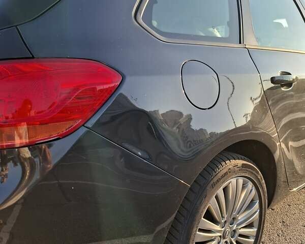 Черный Опель Астра, объемом двигателя 1.4 л и пробегом 236 тыс. км за 8200 $, фото 16 на Automoto.ua