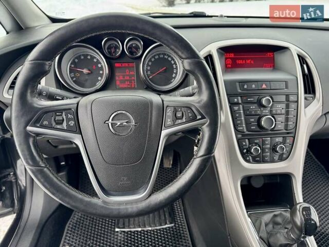Черный Опель Астра, объемом двигателя 1.4 л и пробегом 245 тыс. км за 7499 $, фото 37 на Automoto.ua