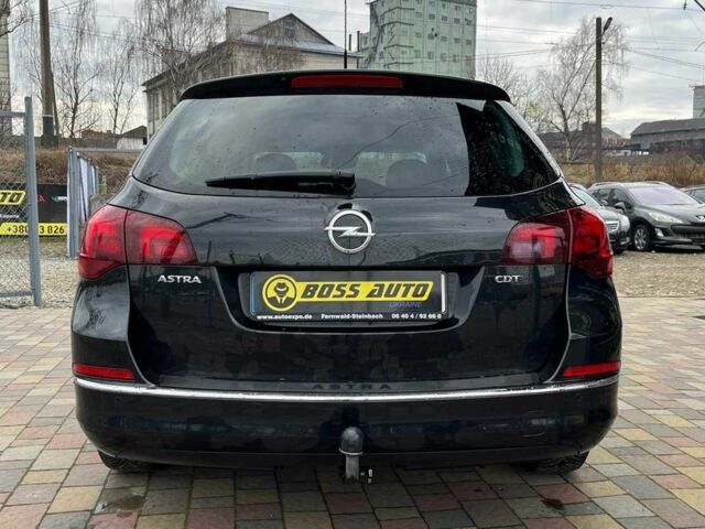 Черный Опель Астра, объемом двигателя 1.7 л и пробегом 285 тыс. км за 8700 $, фото 5 на Automoto.ua