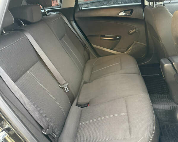 Черный Опель Астра, объемом двигателя 1.7 л и пробегом 258 тыс. км за 6999 $, фото 52 на Automoto.ua