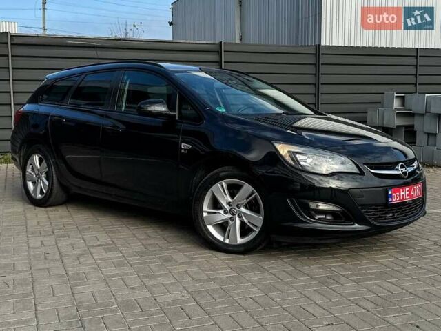 Черный Опель Астра, объемом двигателя 1.7 л и пробегом 218 тыс. км за 8500 $, фото 4 на Automoto.ua