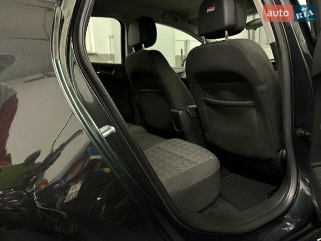 Черный Опель Астра, объемом двигателя 1.4 л и пробегом 203 тыс. км за 7250 $, фото 12 на Automoto.ua